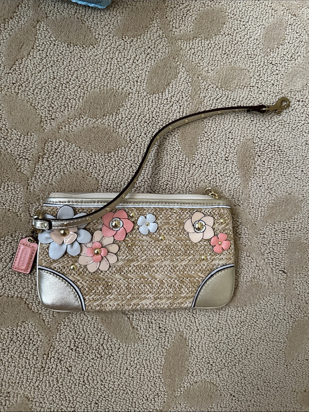 Coach Straw Wristlet with Floral Appliqués and Gold Trim